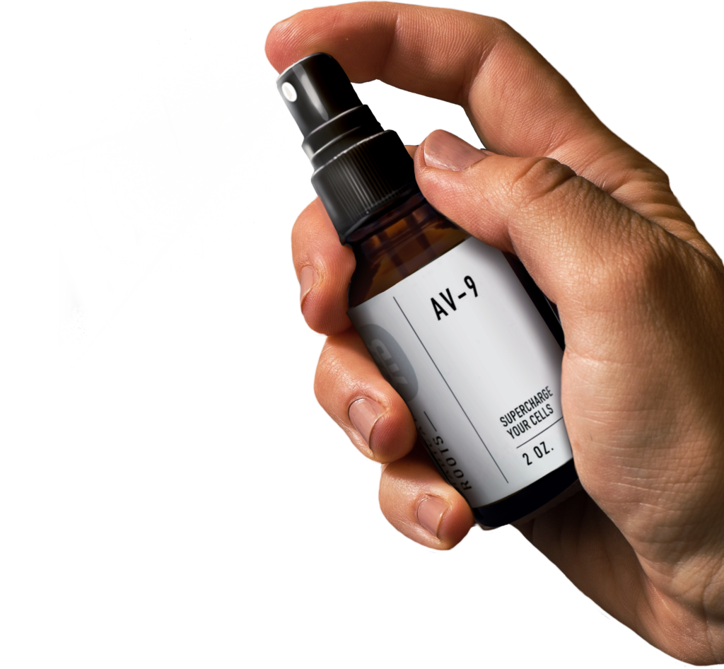 Hand spraying small tincture bottle