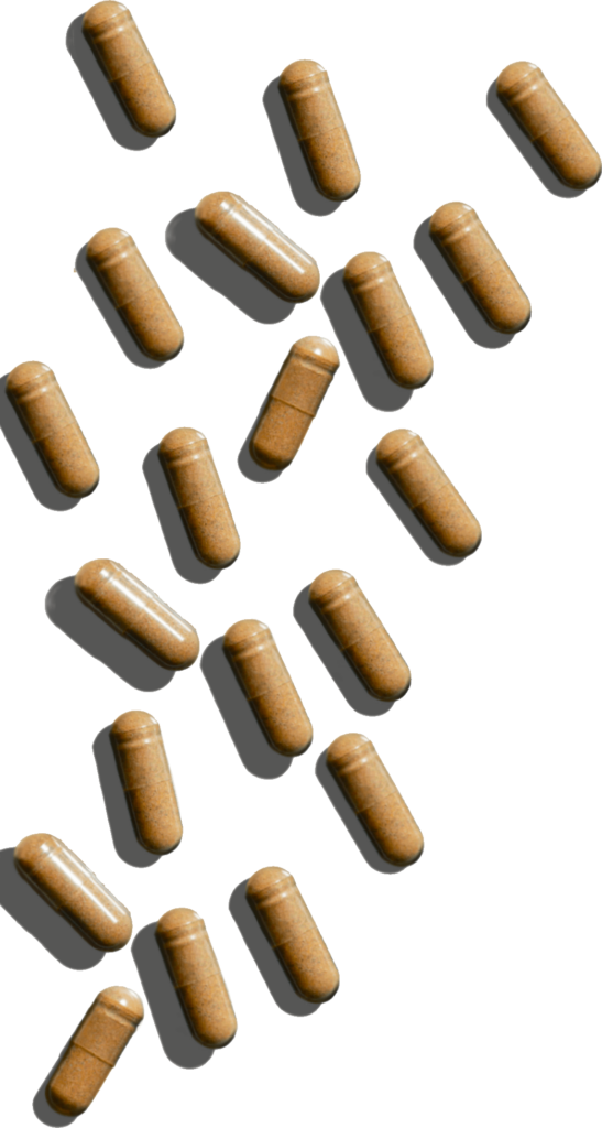 Close-up of pill capsules spread out